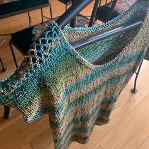 Hand knitted with crochet edge Sold